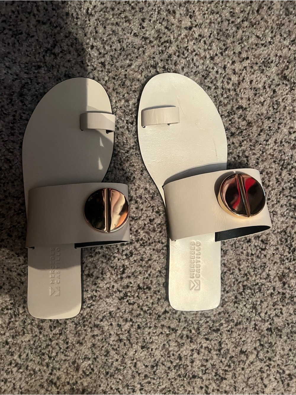 MERCEDES CASTILLO Cream Slide Sandals with Gold Medallion.